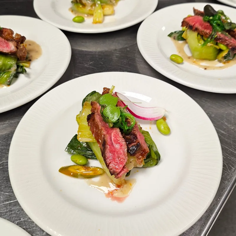 Pan seared Sirloin, Soy sauce marinated edamame, Braised bok choy, Japanese sesame dressing, Marinated wakame (seaweed salad)