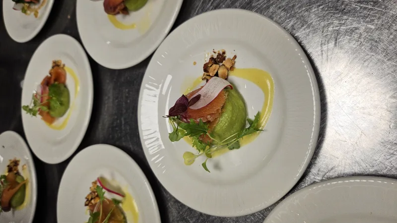 Smoked salmon, Avocado puree, Olive oil emulsion, Crushed smoked almond