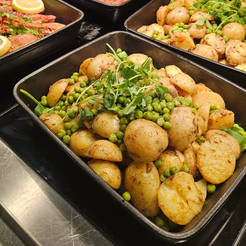 Spiced baby potatoes with green peas